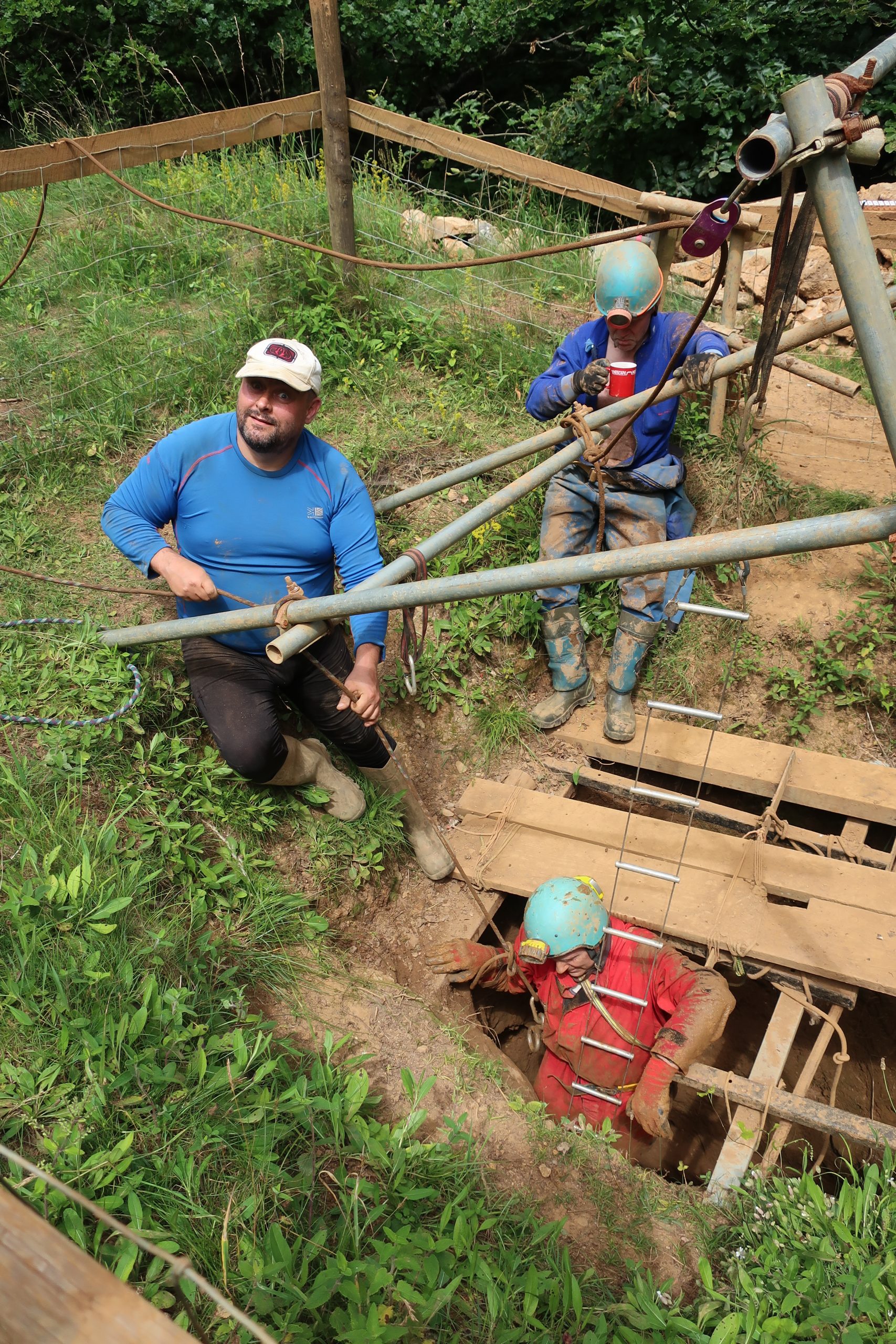 Ed, Bill and Brian on a clearing the shaft digging session by Graham Price